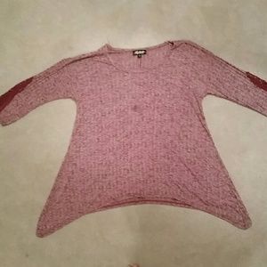 Dark pink top with elbow length sleeves